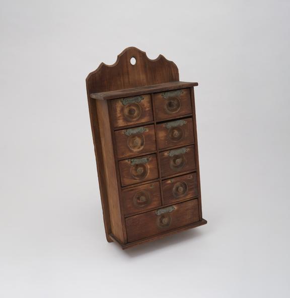 Wall mounted spice cabinet, with nine drawers, unsigned