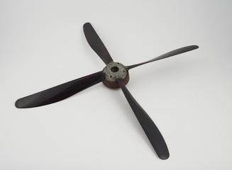 Propeller: four bladed, wind tunnel model, with blades to prop shaft connector