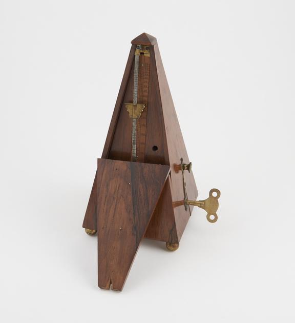 Metronome, mounted in rosewood case (key missing)