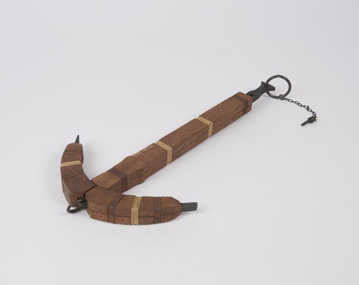 Model of an ancient Roman iron anchor, covered with wood