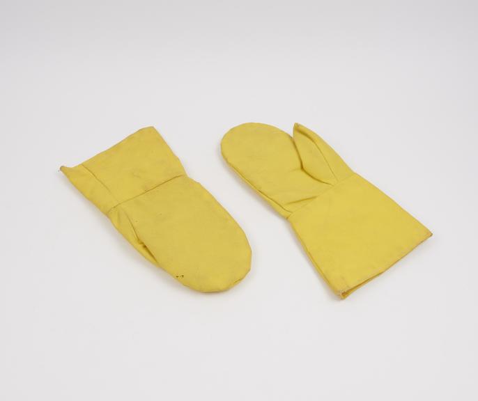 Pair of yellow gauntlets for general use, 1974- 1990.