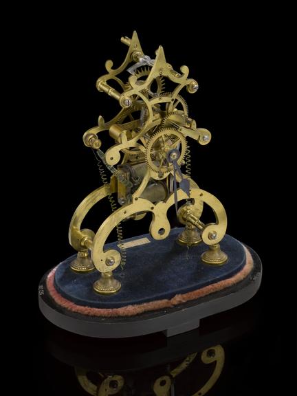 Synchronome self-winding action, on mahogany base