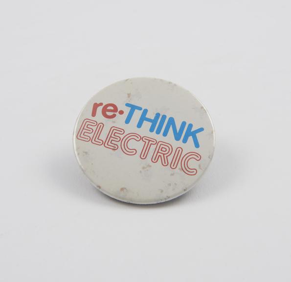 Anti-nuclear energy badge.  Text: Rethink Electric