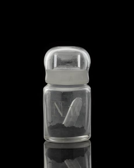 Glass-stoppered bottle containing niobium (part in tube)