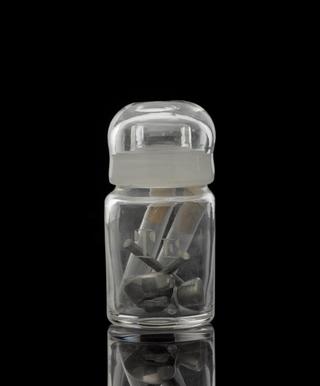 Glass-stoppered bottle containing tellurium