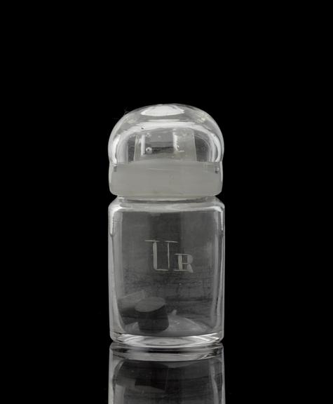 Glass-stoppered bottle containing uranium