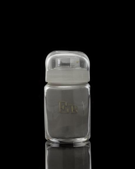 Glass-stoppered bottle containing erbium