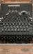 Three-ring Enigma cypher machine in oak wood transit case