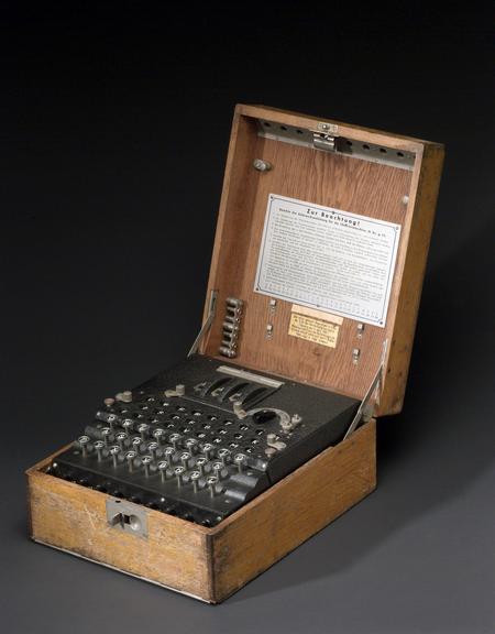 Three-ring Enigma cypher machine in oak wood transit case