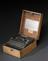 Three-ring Enigma cypher machine in oak wood transit case