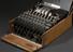 Three-ring Enigma cypher machine in oak wood transit case