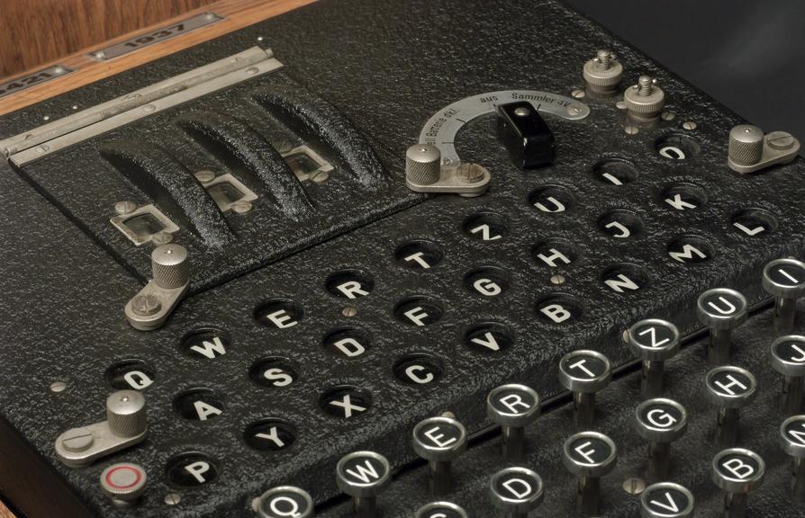 Three-ring Enigma cypher machine in oak wood transit case