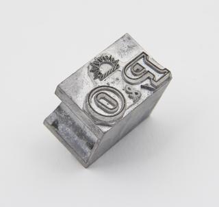 Logotype cast on 72pt body by a Monotype Supercaster