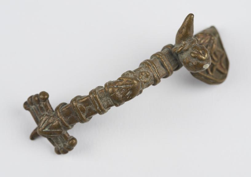 One of 84 Ashanti  brass weights in the form of a decorated