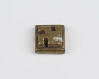 Ashanti brass weight with swastika decoration