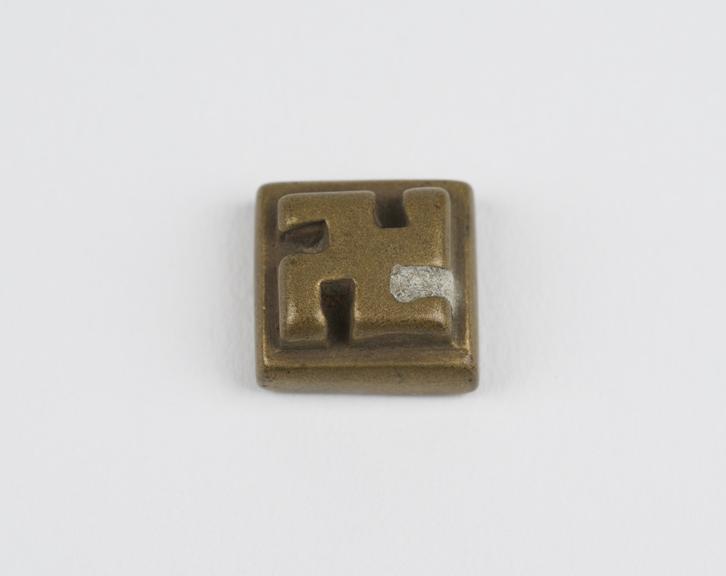 One of 84 Ashanti  brass weights in the form of a square tablet