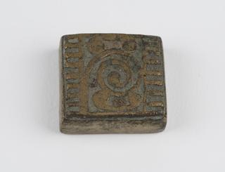 Ashanti brass weight with whorl decoration