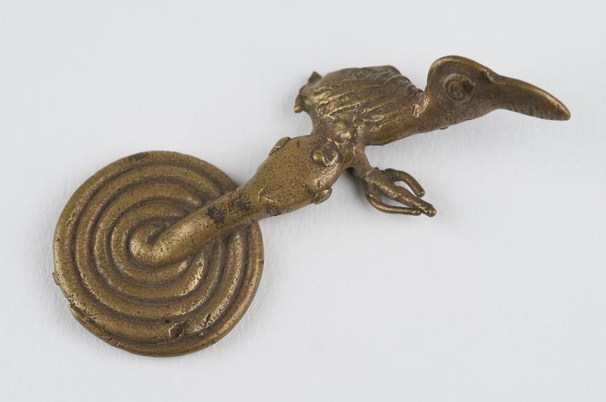 One of 84 Ashanti  brass weights in the form of a bird being