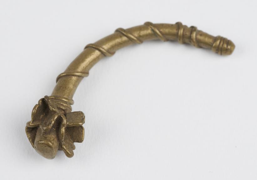 One of 84 Ashanti  brass weights in the form of a decorated