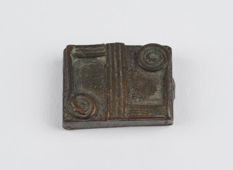 One of 84 Ashanti  brass weights in the form of a rectangular