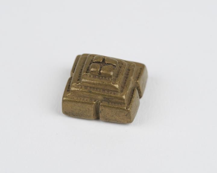 One of 84 Ashanti  brass weights in the form of a stepped