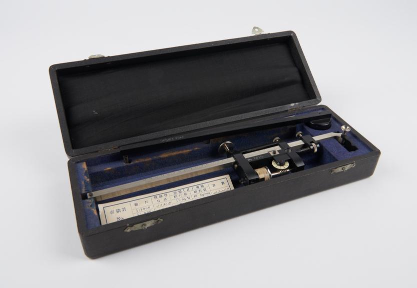 Compensating  [sliding bar] polar planimeter in fitted case by