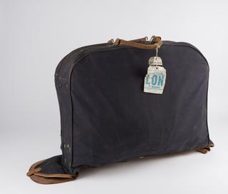 B. F. Goodrich pressure suit (Mark IV) with attached brown leather boots