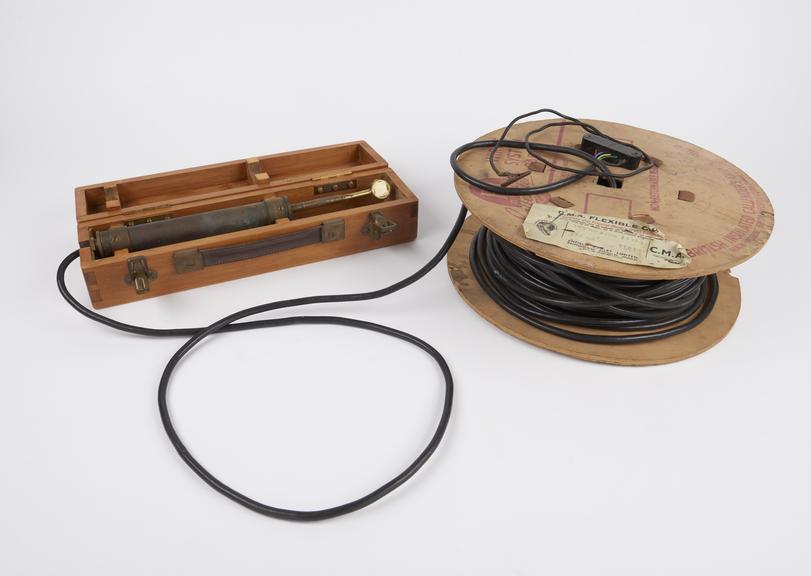 Sonic hydrophone with cable reel, in box