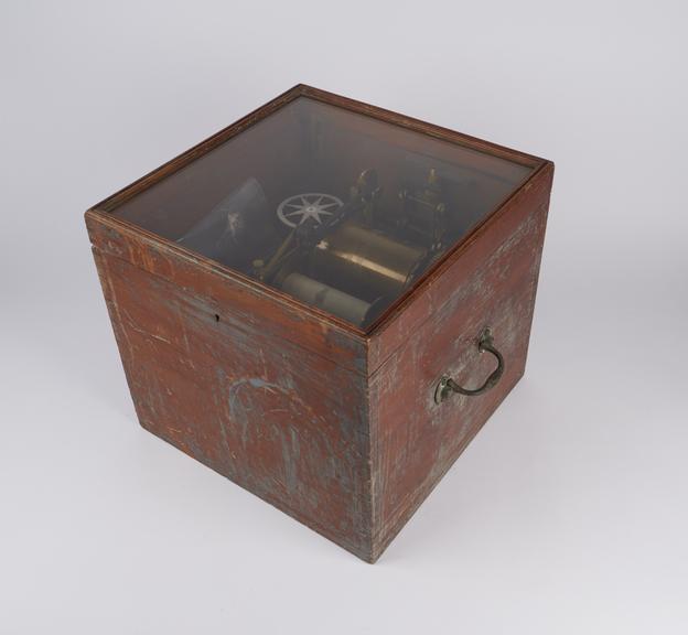 A ship's magnetic course recorder, in mahogany case