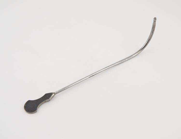 Curved lithotomy staff, with probe end and median groove