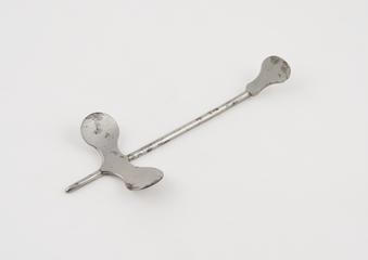 Straight lithotomy director with curved flanges at proximal end and flat