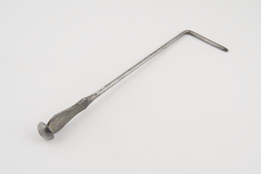 Buchanan type rectangular lithotomy staff with lateral groove