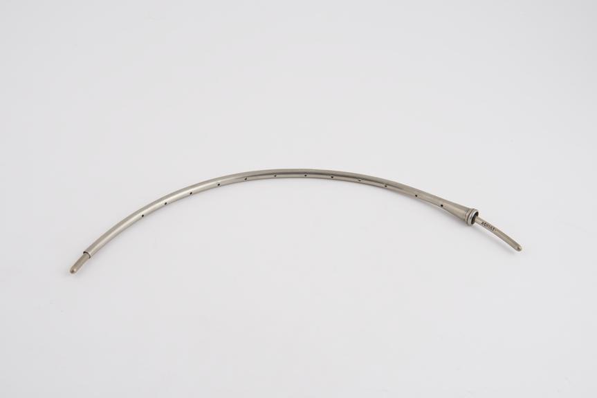 Curved cylindrical catheter with split proxinal end and bougie