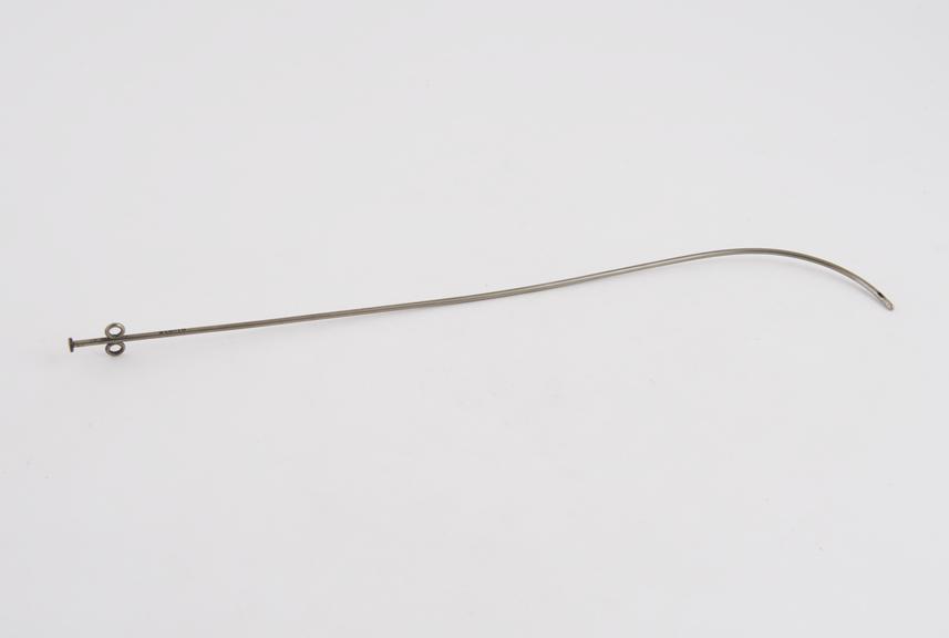 Narrow gauge catheter with proximal curve and stylet, c. 1880