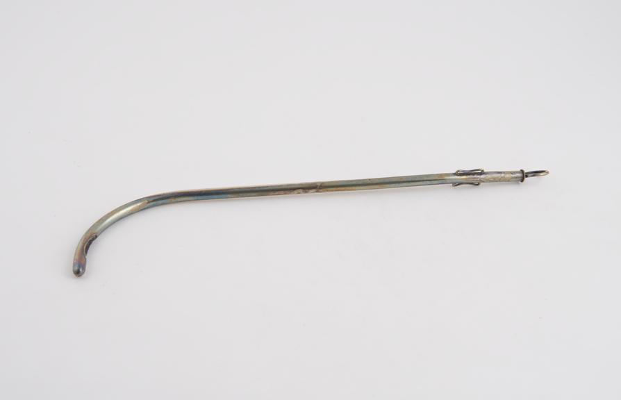 Silver-plated cylindrical catheter with proximal curve and gum