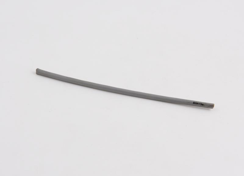 Piece of plastic tubing, possibly part of a broken catheter, c