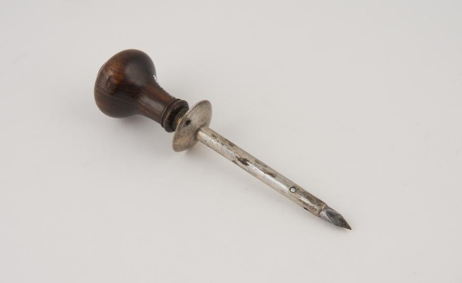 Trocar, steel, with silver(?) cannula and wooden handle