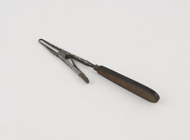 Assalini artery forceps, steel and ebony, by Evans and Co