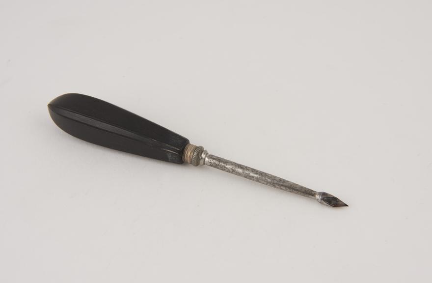 Trocar, steel, with ebony handle, made by Maw, English