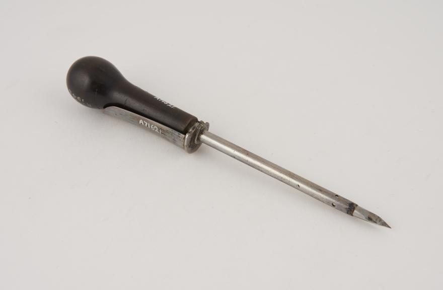 Trocar with cannula, with silver cannula and ebony handle