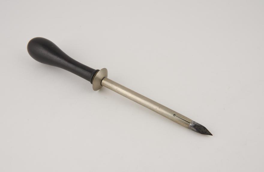 Trocar, steel, with white metal cannula and ebony handle