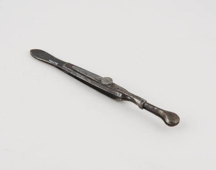 Bryant's torsion forceps, broad-head, steel, British