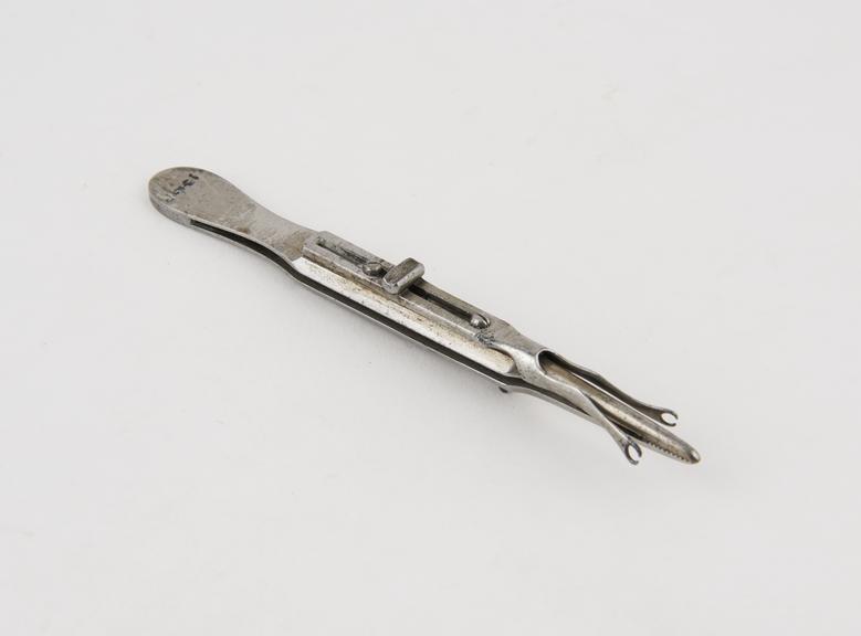 Torsion forceps, steel, sliding attachment, spring-catch