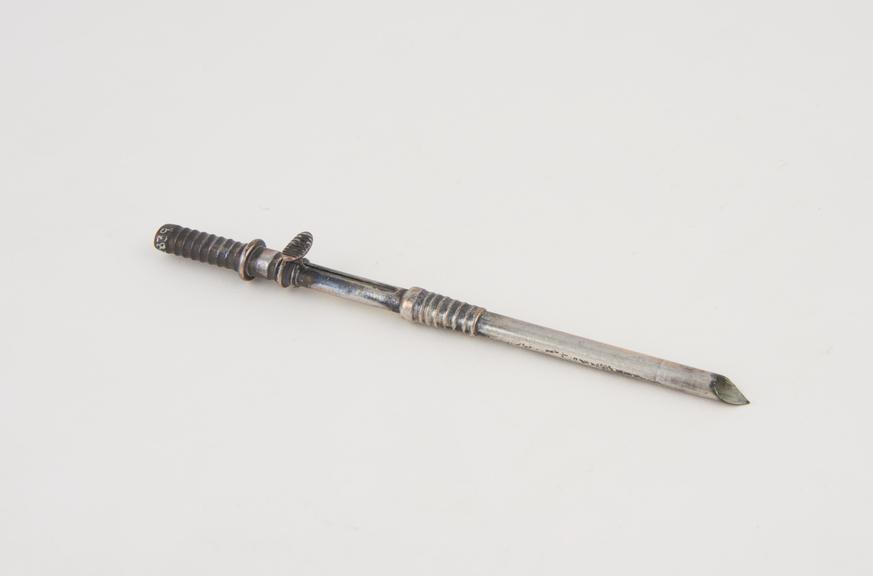 Trocar, with cannula, white metal(?), made by Down Bros