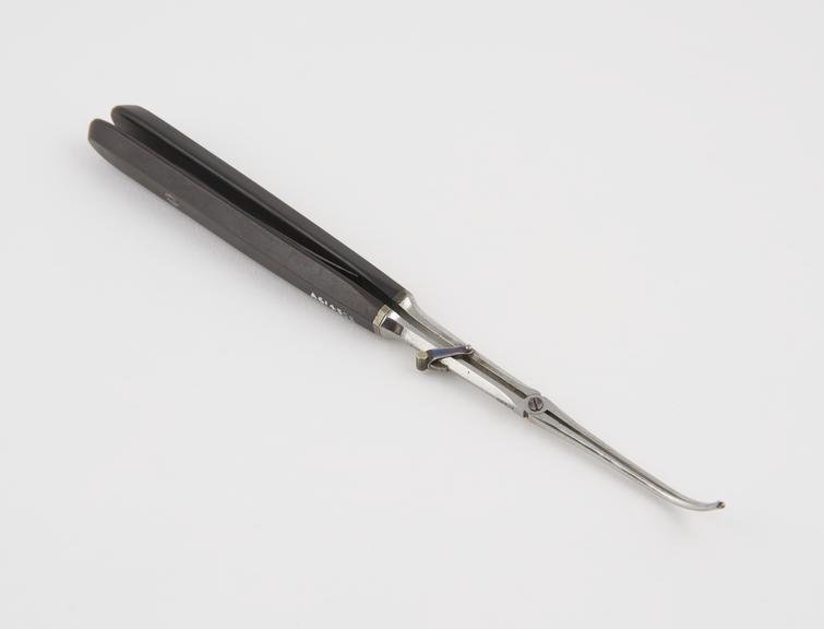 Forceps, possibly ophthalmic, steel and ebonite, by Aubry