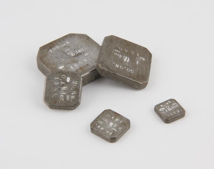 One of three sets metric commercial weights from W?rttemberg