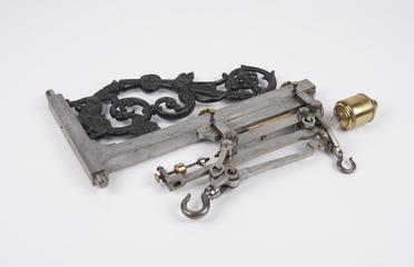 A compound lever balance in steel and brass with a mechanical advantage of 10:1 and 100:1