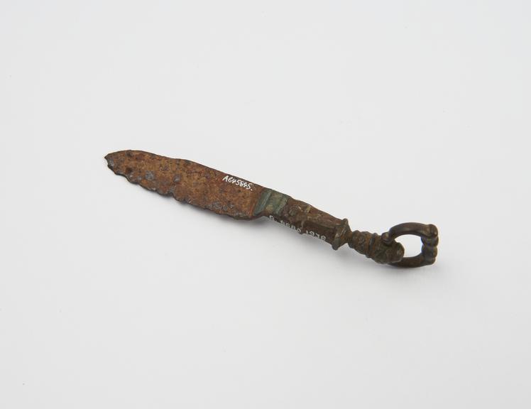 Knife, iron and bronze, with looped decorated handle