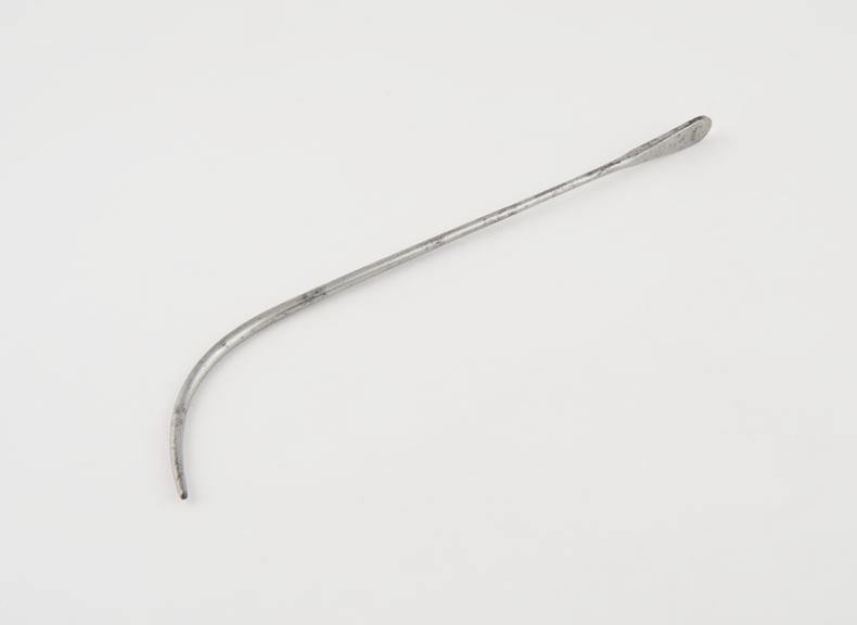 Urethral cound, with tapered proximal curve and metal handle