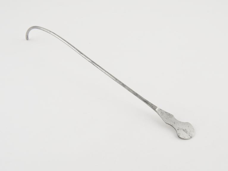 Urethral sound, with proximal curve and flat metal handle